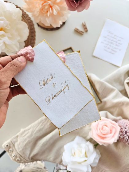 A simple, elegant welcome note for wedding guests, written on deckled edge cotton paper with gold ink. A small, thoughtful touch for a big new beginning.