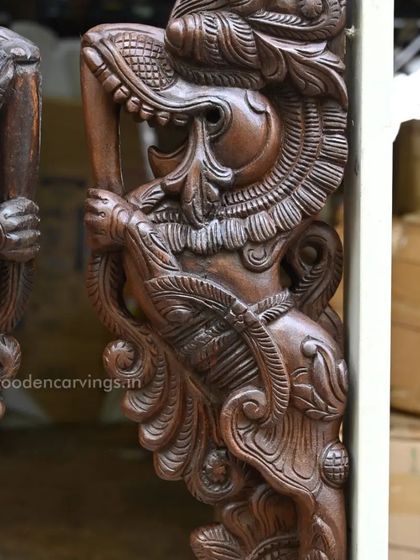 A pair of 24-inch standing Yaazhi brackets with a dark, polished finish. This close-up shows the powerful stance and fierce expression of the mythical creatures.