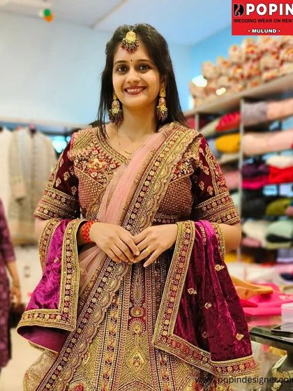 A happy bride-to-be trying on her dream wedding lehenga. The joy on her face is why I do what I do, ensuring every bride feels her absolute best.