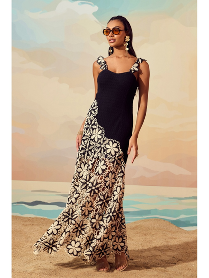 A full-length shot of the Floral Crochet Knit Dress by Qala Clothing, showcasing the beautiful contrast and craftsmanship of the piece.