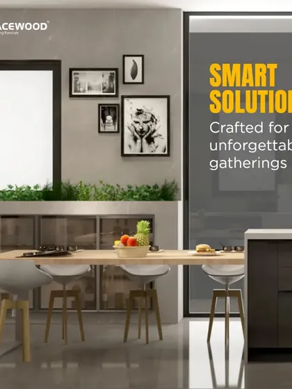 A kitchen designed for gatherings, this layout features a long breakfast bar extending from the main island. The dark wood-look cabinets are contrasted with a clean white countertop, and integrated planters add a touch of green.