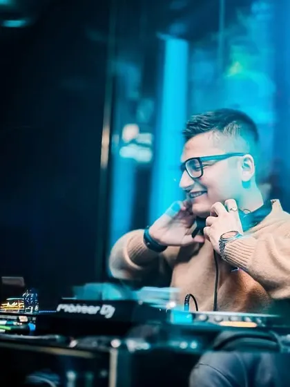A happy moment behind the decks. When the mix is perfect and the crowd is with you, there's no better feeling.