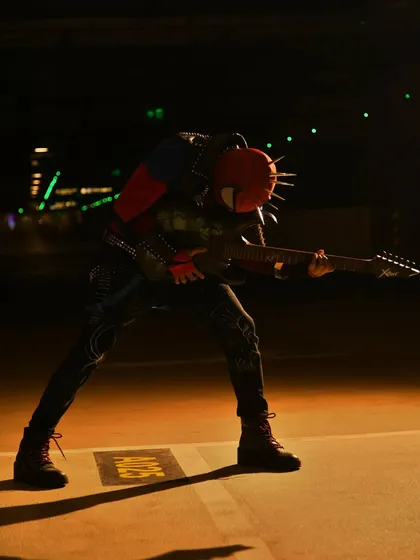 Another dynamic pose in my Spider-Punk cosplay. The lighting in this parking garage gave it a really cool, moody vibe.