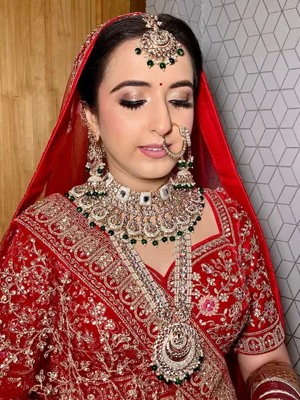 My lovely bride Vismita. I created a glamorous look with glittery eyes and a flawless base that made her shine on her special day.