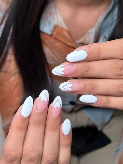 A close-up on the clean lines of the negative space heart nails. This is a great example of my precise, hand-painted line work.