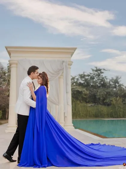 A classic romantic pose. The makeup is elegant and timeless, ensuring these anniversary photos will be treasured forever.
