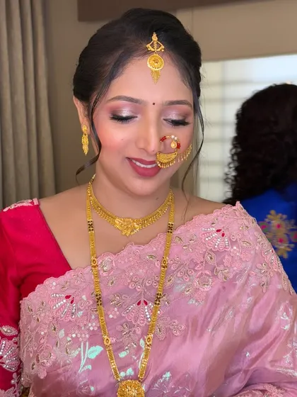 A close-up of the soft, shimmery eye makeup and flawless skin for this traditional look.
