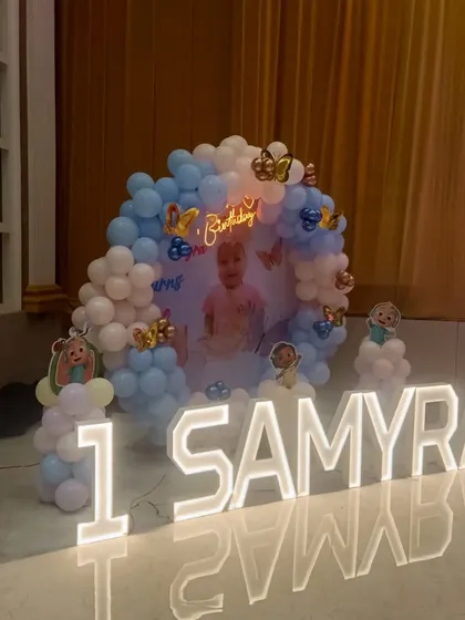 Another view of Samyra's beautiful first birthday stage decoration, showing how all the elements come together to create a perfect photo opportunity.