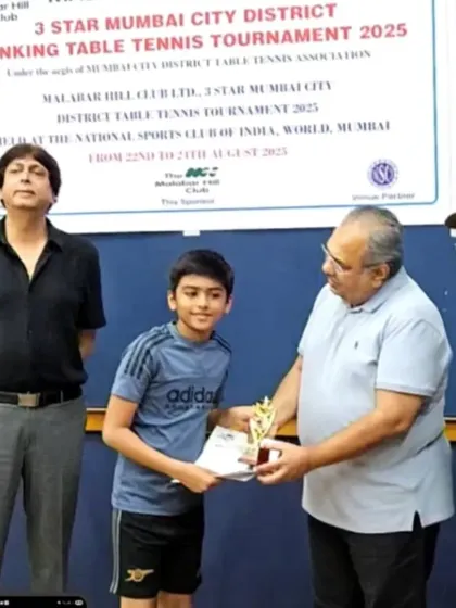 One of our U-11 semi-finalists, Arnav Bhatter, receiving his trophy at the District Ranking Tournament. We focus on nurturing talent from the very beginning of their table tennis journey.