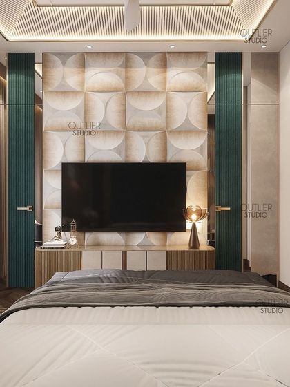 Calling all Netflix enthusiasts. This bedroom features a media wall with a unique 3D cushioned paneling, creating a comfortable and stylish spot for watching movies.
