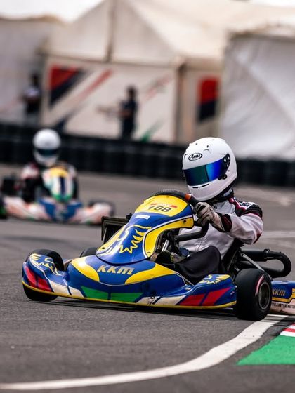A driver in our Kart Republic chassis navigates the track during the Meritus Cup, demonstrating the performance edge our equipment provides.