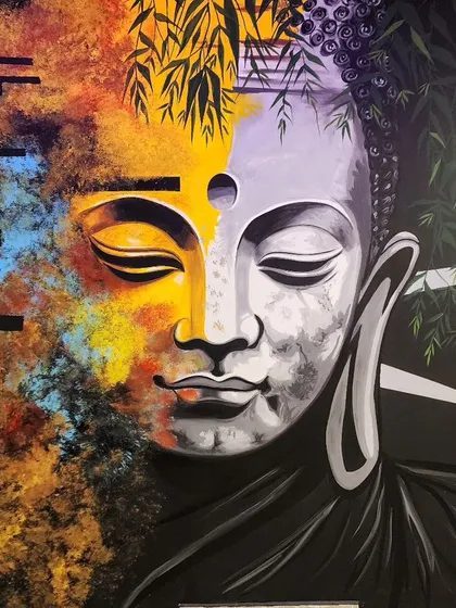 This abstract Buddha mural was designed for a spa to create a tranquil and modern atmosphere. We used a split-face design, blending vibrant, warm colors with a calm, monochrome palette to represent two sides of the same peaceful energy.