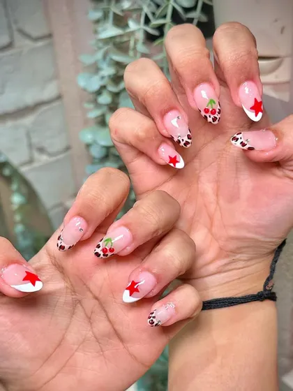 A playful and trendy set featuring hand-painted cherries, stars, and animal print. We love mixing and matching different motifs.