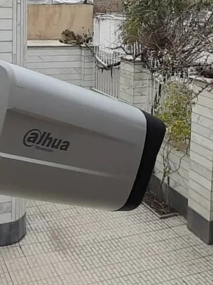This Dahua camera is installed to overlook a residential courtyard. We help you choose the right camera placement to secure your home's perimeter and entry points.