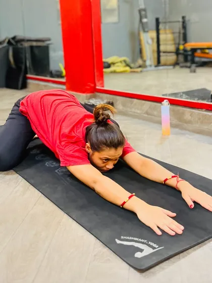 Shashankasana (Hare Pose) is a restorative posture that gently stretches the back and calms the mind.