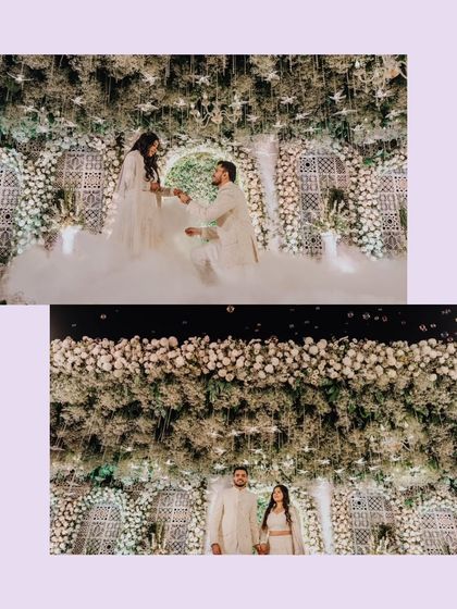 A dreamy proposal scene amidst clouds of smoke and a wall of white flowers. A fairytale moment for Preeti and Ravi.