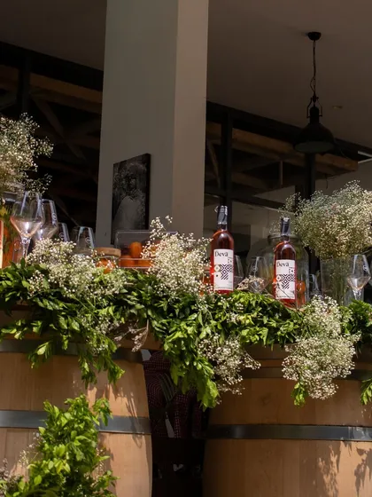 The beautiful setup for our Wine Picnic, with wine barrels decorated with fresh flowers.