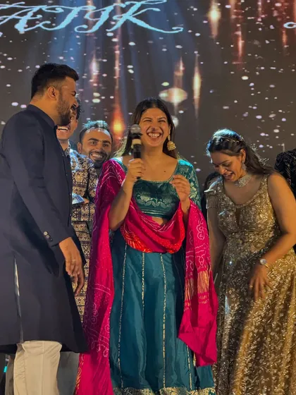 A moment of genuine, uncontrollable laughter on stage with the family. These are the candid moments that truly define a successful event.
