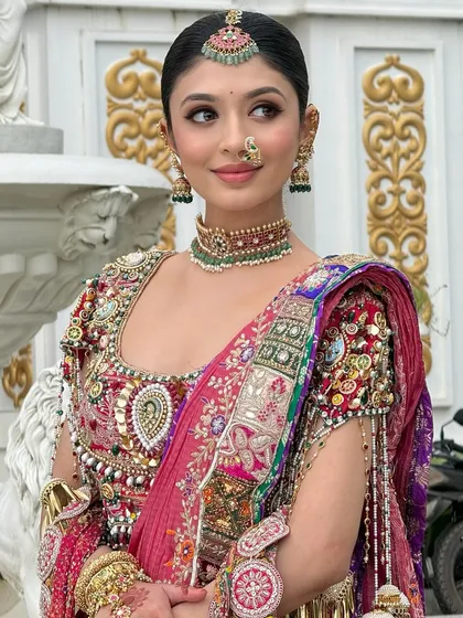 This is the level of artistry I teach. Notice the flawless skin finish, the sharp winged eyeliner, and the perfectly blended eyeshadow that complements the intricate jewellery. In my classes, you will learn how to create these iconic, modern Maharashtrian bridal looks that feel both royal and contemporary.