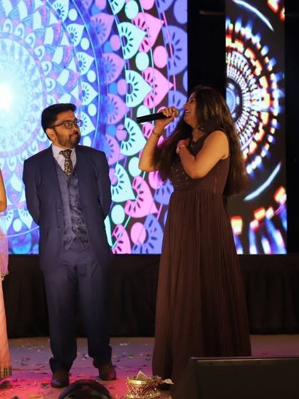 Another shot from our on-stage sangeet activities. Keeping the energy high and the guests engaged is key to a memorable sangeet night.