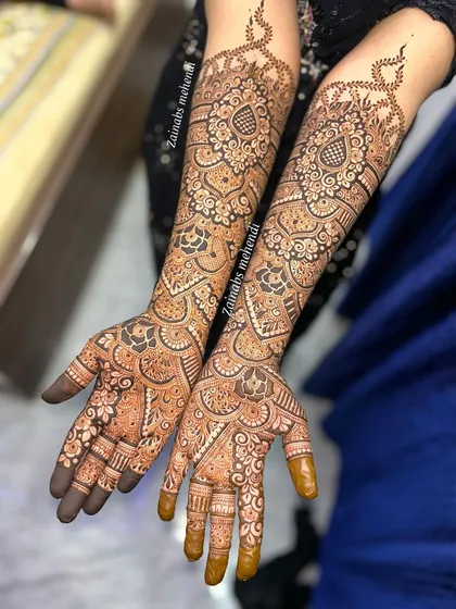 A full bridal design with large mandala motifs.