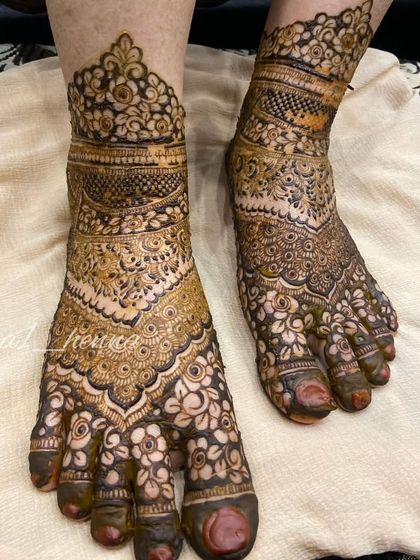 The rich texture of this Pakistani bridal foot henna is evident in this close-up shot.