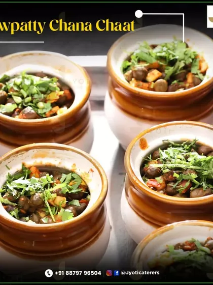 Savoring the flavors of Mumbai with this Chowpatty Chana Chaat. Served in traditional ceramic pots, it's a spicy and tangy street food classic.