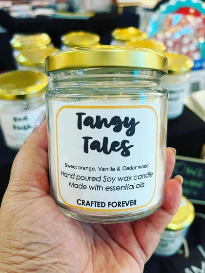 Introducing our hand-poured soy wax candles! This one is 'Tangy Tales', a beautiful blend of sweet orange, vanilla, and cedarwood essential oils. They are 100% vegan and designed to fill your space with a wonderful, natural fragrance.