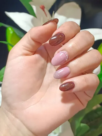 Beautifully done nails are a confidence booster. This design is a perfect example of how we combine color and texture for a unique finish.