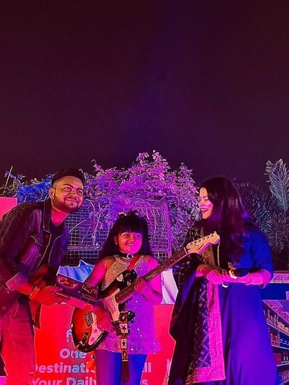 A fun moment on stage with a young rockstar and her mentor. I love seeing talented kids perform.