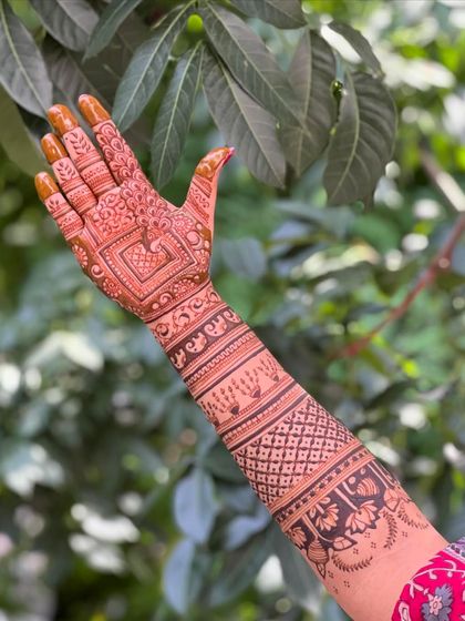 A single-hand view of the intricate design, focusing on the detail and clean lines.