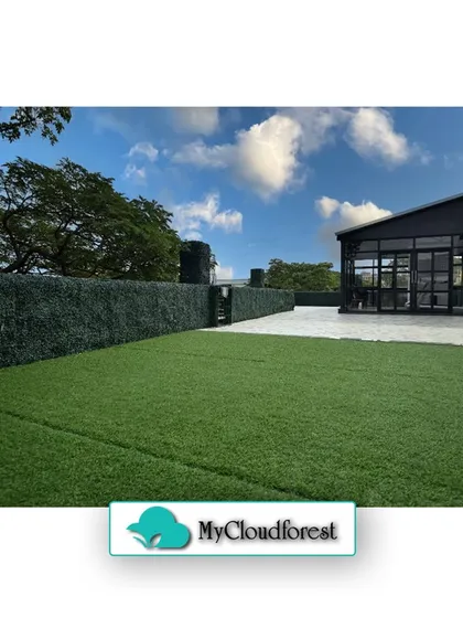 My services extend to large-scale projects, including expansive lawns and privacy screening. Here, I installed premium artificial grass for a perfectly manicured look without the upkeep, complemented by a tall, dense artificial hedge that provides immediate and lasting privacy.