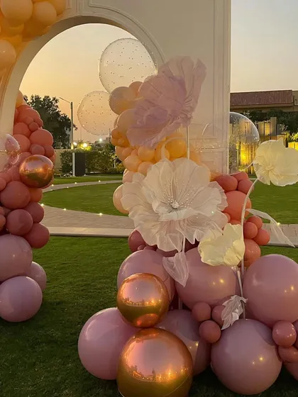 Another angle of the beautiful balloon decor, capturing the soft light of the setting sun.