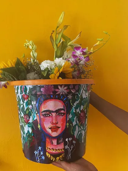 This Frida Kahlo planter is one of my favorite pieces. I used bold colors and intricate details to capture her spirit, turning a simple planter into a vibrant piece of home decor that really makes a statement.