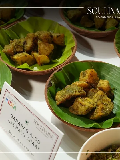 Banaras Aloo Kachalu Chaat served in a banana leaf-lined bowl. We love to showcase regional Indian specialties with authentic and eco-conscious presentation.