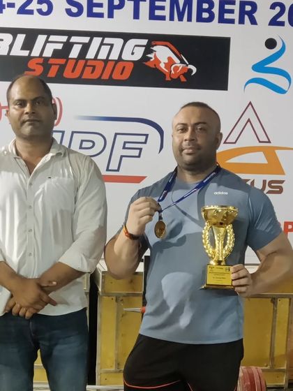 With my gold medal and Strong Man trophy from the Senior Delhi State equipped powerlifting competition.