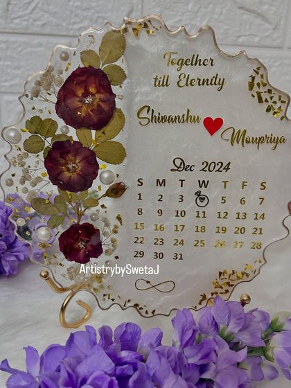 The full view of the floral calendar plaque, a perfect blend of love and art.