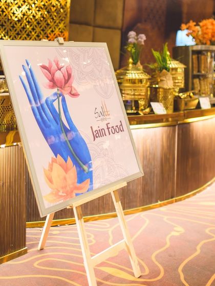 We cater to all dietary needs with grace and authenticity. This sign for our dedicated Jain Food counter at a grand event shows our commitment to providing delicious options for every guest.