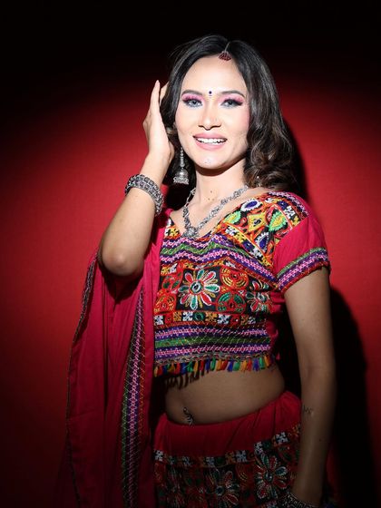 A happy and bright shot from the Navratri series. The makeup is designed to be sweat-proof and long-lasting, ensuring you look fresh and vibrant throughout the festivities.