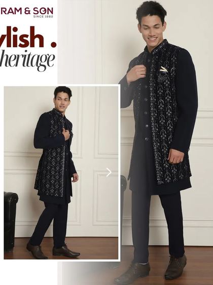 Stylish heritage. This navy blue Indo-Western ensemble, featuring a printed stole, seamlessly blends tradition and contemporary design for a look that's both refined and modern.