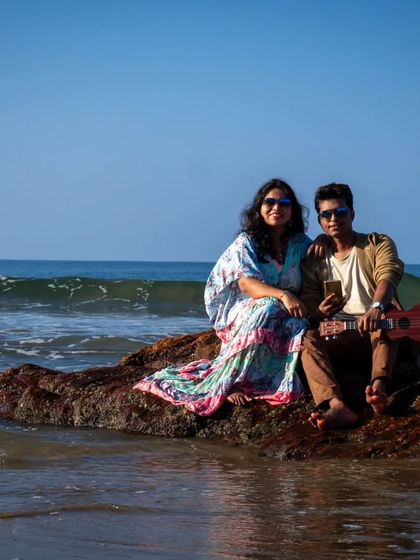 Adding a personal touch with a ukulele. This couple brought along an instrument for their beach photoshoot, and it resulted in some fun, unique, and personal images.