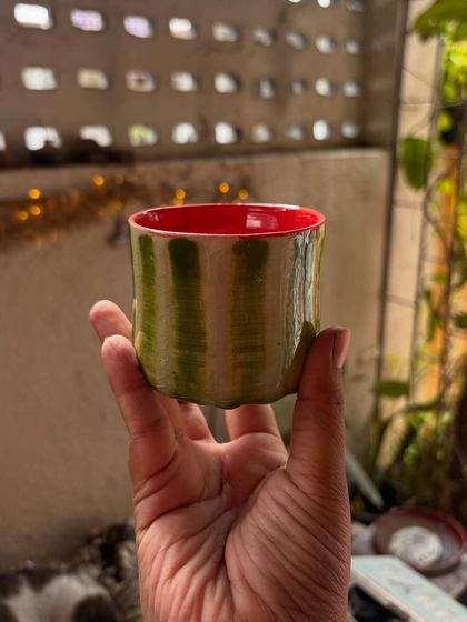 I loved teaching this student, who focused on enjoying the process rather than chasing perfection. That's why her work, from the Nerikomi tray to the quirky green face vase, turned out so beautiful and full of joy.