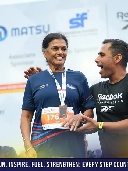 A candid moment of celebration with one of my athletes on the podium. These are the moments we train for.