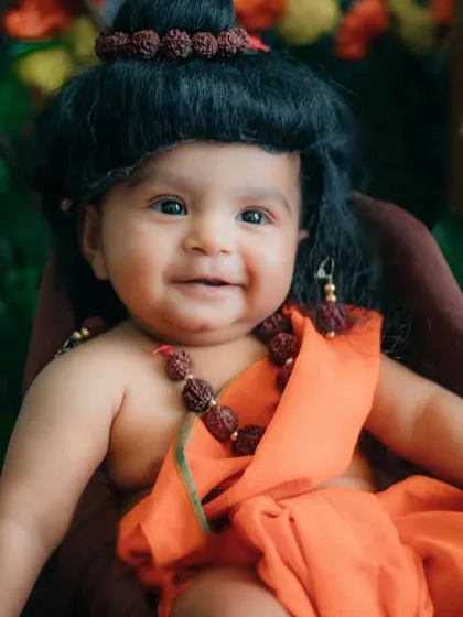 The happiest little Lord Ram, with a smile that radiates pure joy and blessings.
