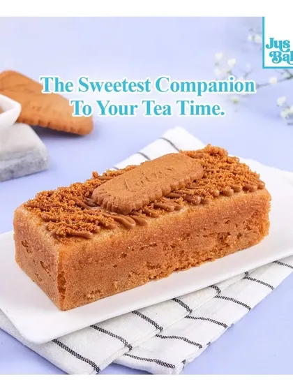 Our Gooey Lotus Biscoff Tea Cake is the perfect companion for your afternoon tea. This moist loaf cake is infused with Biscoff flavor and topped with more Biscoff spread and a signature cookie.