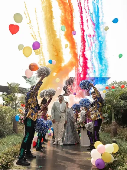 A grand welcome for the happy couple, showered with color and joy. We believe in creating high-energy, personalized entries that reflect the couple's spirit, using elements like color bombs and coordinated performers to make their arrival an unforgettable spectacle.
