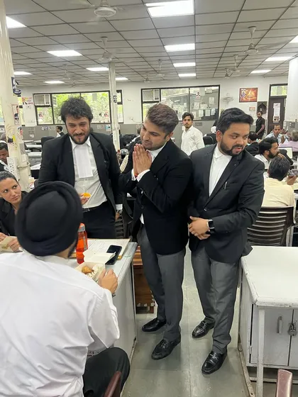 Greeting a senior advocate with a 'namaste' as a sign of respect.