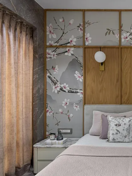 A serene bedroom where soft, flowing curtains in a neutral tone complement the custom Chinoiserie wallpaper. The drapery is chosen to soften the light and add a layer of tranquility, enhancing the room's overall sense of calm and luxury.