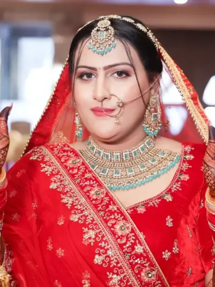 My beautiful bride glowing with happiness on her wedding day, showing off her intricate mehandi.