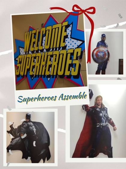 The entrance to this superhero party featured a "Welcome Superheroes" sign in a bold, comic-book font. Cutouts of Thor, Batman, and Captain America were placed around the venue to build excitement from the moment guests arrived.